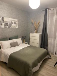 Ένα ή περισσότερα κρεβάτια σε δωμάτιο στο Villa Buff-ô-T'iu - 3 chambres
