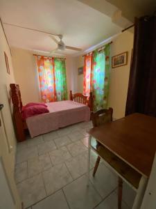 Postel nebo postele na pokoji v ubytování Le petit coin tranquille