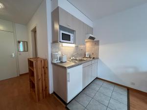 Kuchyň nebo kuchyňský kout v ubytování Studio for 2 people with parking