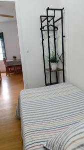 Postel nebo postele na pokoji v ubytování Un racò a L'Alt Empordà