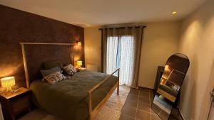 a bedroom with a large bed and a window at Maison Love Lane in Cagnes-sur-Mer +46 photos