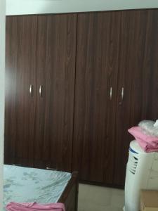Ένα ή περισσότερα κρεβάτια σε δωμάτιο στο Home Stay