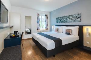Letto o letti in una camera di Hotel Bristol Zurich