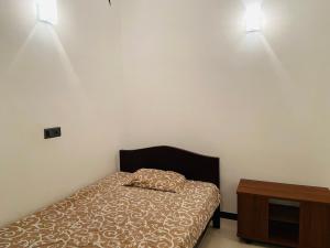 Postel nebo postele na pokoji v ubytování Rash Holiday Inn-Malabe Colombo