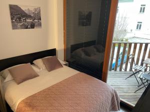 Ένα ή περισσότερα κρεβάτια σε δωμάτιο στο Apartment Obsidian