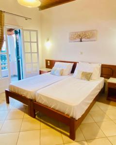 Voodi või voodid majutusasutuse Aphrodite Suites & Apartments with Swimming Pool toas