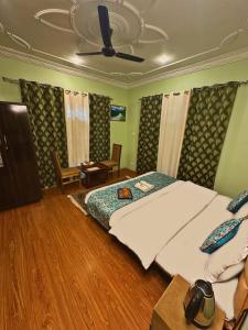 Katil atau katil-katil dalam bilik di Faizzy residency