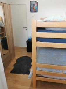 Ένα ή περισσότερα κρεβάτια σε δωμάτιο στο Chambre chez l'habitant