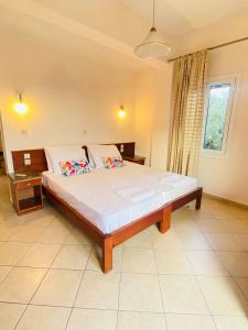 Voodi või voodid majutusasutuse Aphrodite Suites & Apartments with Swimming Pool toas