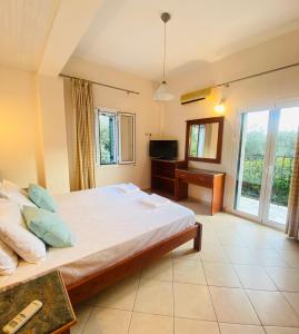Voodi või voodid majutusasutuse Aphrodite Suites & Apartments with Swimming Pool toas