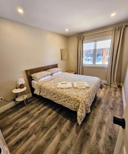 Voodi või voodid majutusasutuse Spruce Suite toas