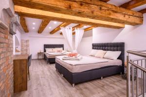 Ένα ή περισσότερα κρεβάτια σε δωμάτιο στο The Superior Loft