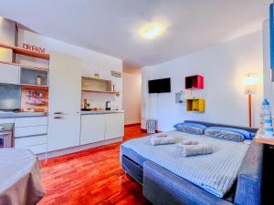 a bedroom with a bed with two pillows on it at Tra Onde & Vicoli - Parcheggio PRIVATO in Porto Recanati