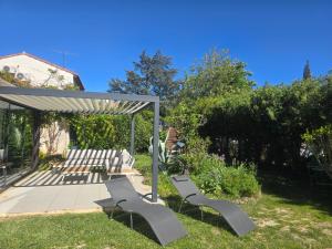 Κήπος έξω από το Maison Climatisée, Jardin, Piscine, 7 pers +10 φωτογραφίες