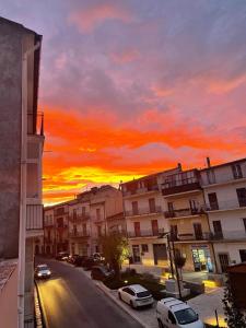 a view of a city street with a sunset at Vlas's home in Oppido Lucano +3 photos
