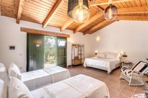 Postel nebo postele na pokoji v ubytování Casale Giancesare Villa Agricola + 37 fotografií