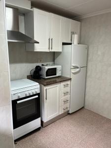 Kuchyňa alebo kuchynka v ubytovaní Apartamento CA VALEN 4