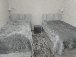 Guest house number 1客房内的一张或多张床位