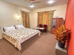 Postel nebo postele na pokoji v ubytování Kashmiri kothi - Srinagar stay