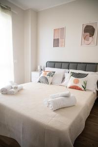 Postel nebo postele na pokoji v ubytování Ambra Apartments