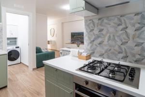Kuchyň nebo kuchyňský kout v ubytování Ambra Apartments + 18 fotografií