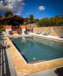 Πισίνα στο ή κοντά στο Cabañas Altos del Tintero