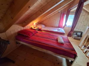 Voodi või voodid majutusasutuse Charmante maisonnette avec vue sur les montagnes toas
