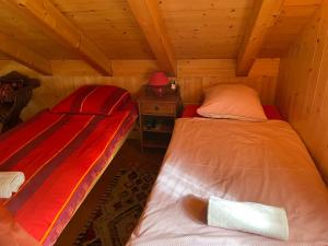 Voodi või voodid majutusasutuse Charmante maisonnette avec vue sur les montagnes toas