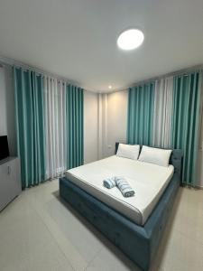 Postel nebo postele na pokoji v ubytování Hotel Erta