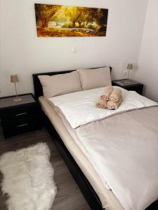 a bed with two pillows on it in a bedroom at Casa Bruno in Vodnjan +34 photos