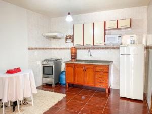 Η κουζίνα ή μικρή κουζίνα στο Apartamentos da Jo