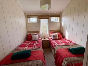 Giường trong phòng chung tại Hares Haven - Pet Friendly +21 ảnh