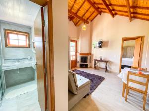 Ένα ή περισσότερα κρεβάτια σε δωμάτιο στο Apartamentos da Jo