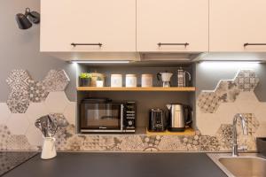 Cucina o angolo cottura di Tiny & Tidy Studio in the key area of Milan