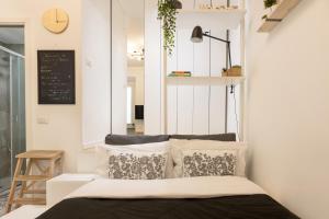Area soggiorno di Tiny & Tidy Studio in the key area of Milan