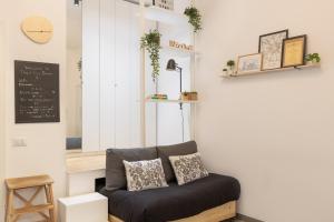 Area soggiorno di Tiny & Tidy Studio in the key area of Milan