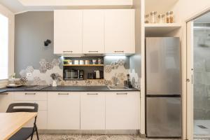 Cucina o angolo cottura di Tiny & Tidy Studio in the key area of Milan