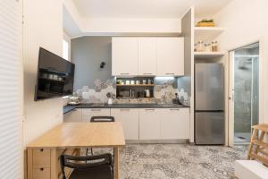 Cucina o angolo cottura di Tiny & Tidy Studio in the key area of Milan