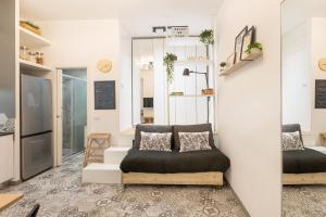 Area soggiorno di Tiny & Tidy Studio in the key area of Milan