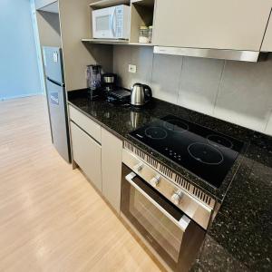 Kuchyň nebo kuchyňský kout v ubytování Edificio Life Sta Teresa