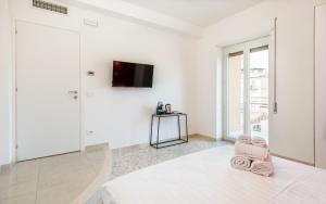 Postel nebo postele na pokoji v ubytování MM Ciampino Rooms