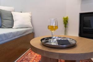 TV a/nebo společenská místnost v ubytování Atman Eco Lodge