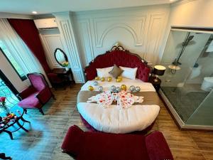 Voodi või voodid majutusasutuse Luxury Hanoi Hotel toas
