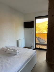 Postel nebo postele na pokoji v ubytování Glamping Jezero