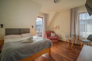 Posteľ alebo postele v izbe v ubytovaní Tatry Panorama