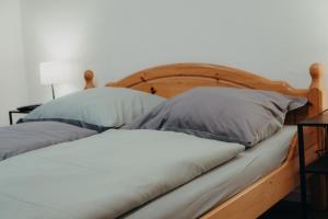 two beds sitting next to each other in a bedroom at EifelNest Blankenheim in Blankenheim +16 photos