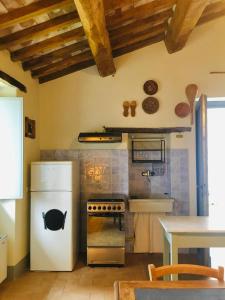 Kuchyň nebo kuchyňský kout v ubytování CasaLeMonache appartamenti in casale in Umbria