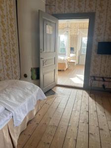 Postel nebo postele na pokoji v ubytování Thottska Villan