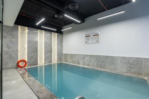a pool in a room with a swimming pool at فندق ليورا Liora Hotel in Riyadh