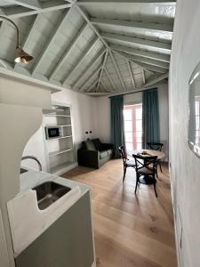 a living room with a couch and a table at LorPalma in Los Sauces +30 photos